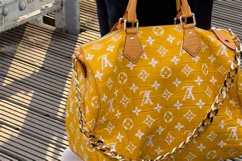 pharrell louis vuitton yellow bag|pharrell luxury bag.